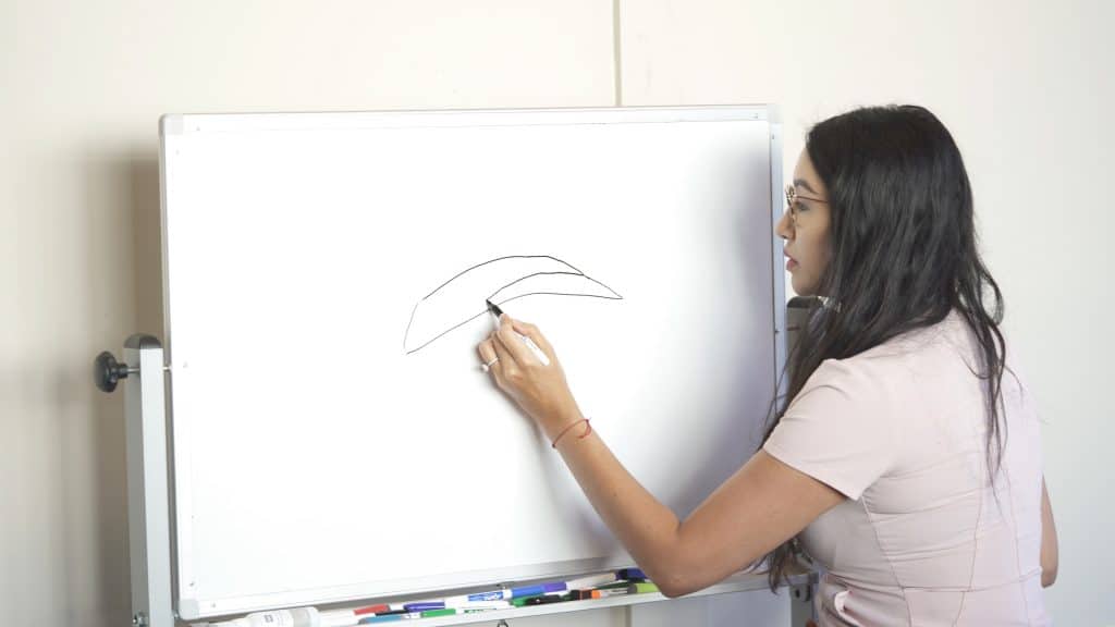hotaru drawing on white board during training