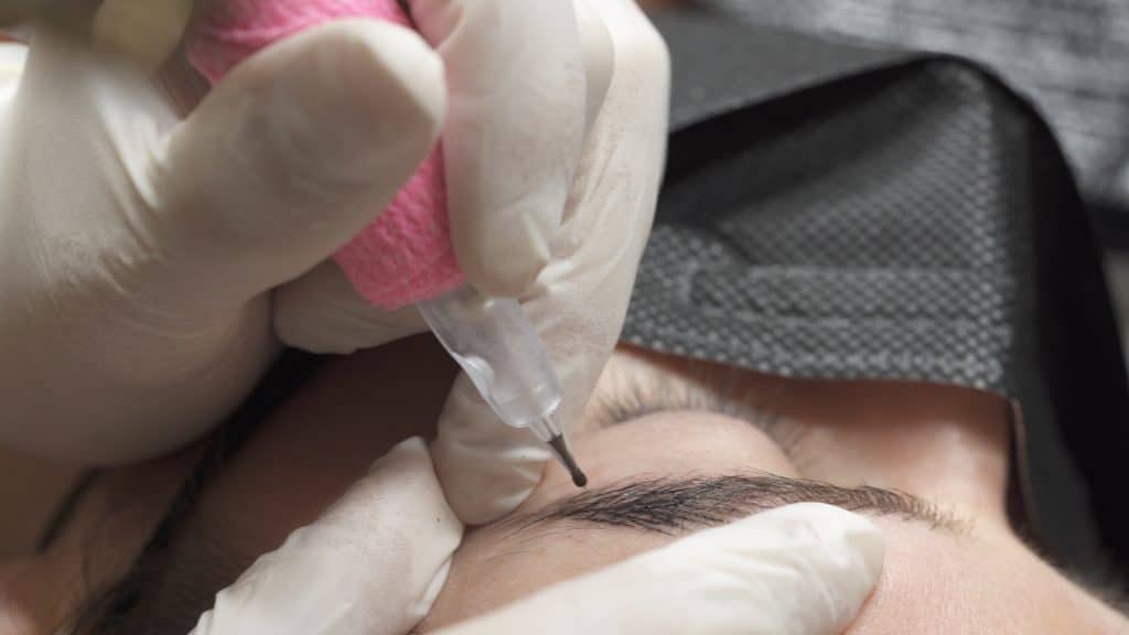 permanent eyebrows applied close up